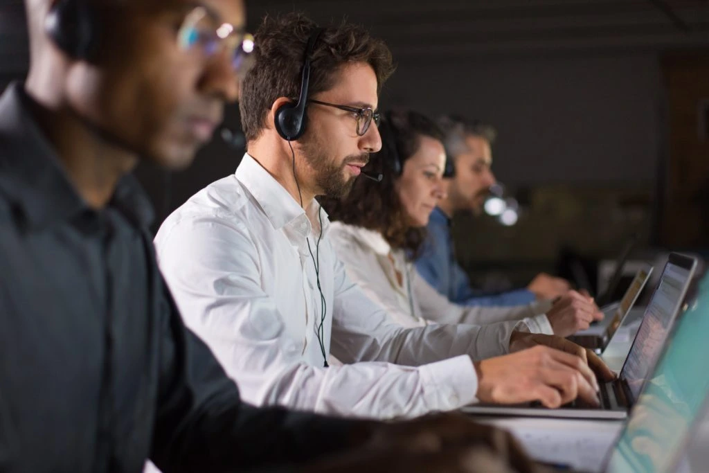Customer support team assisting international car buyers