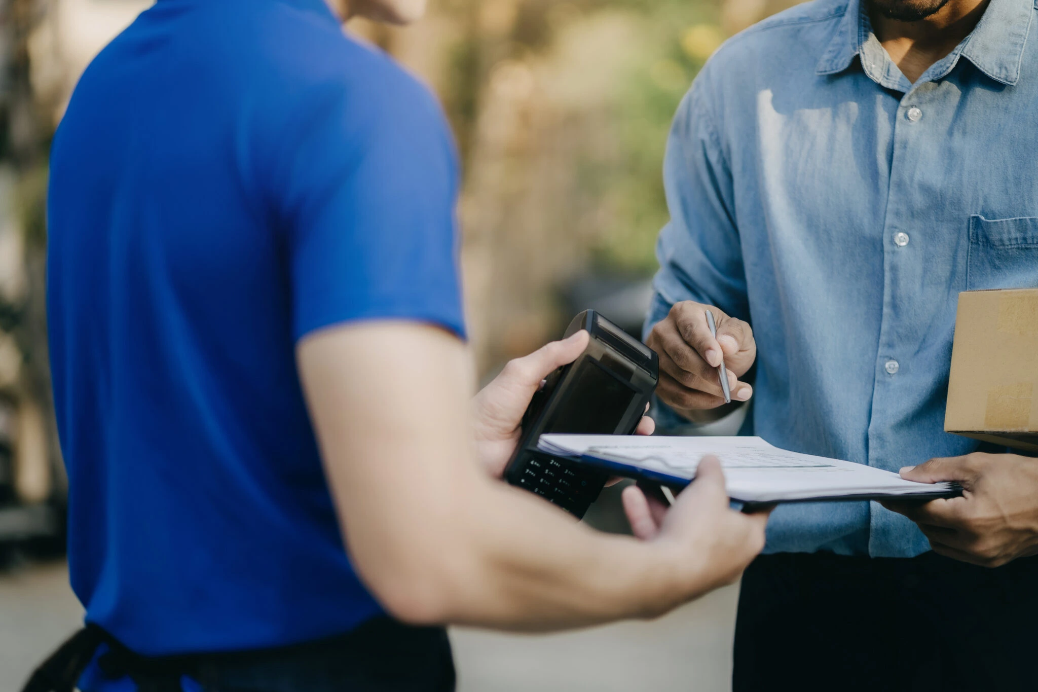 European vehicle export dealer completing car shipping documents